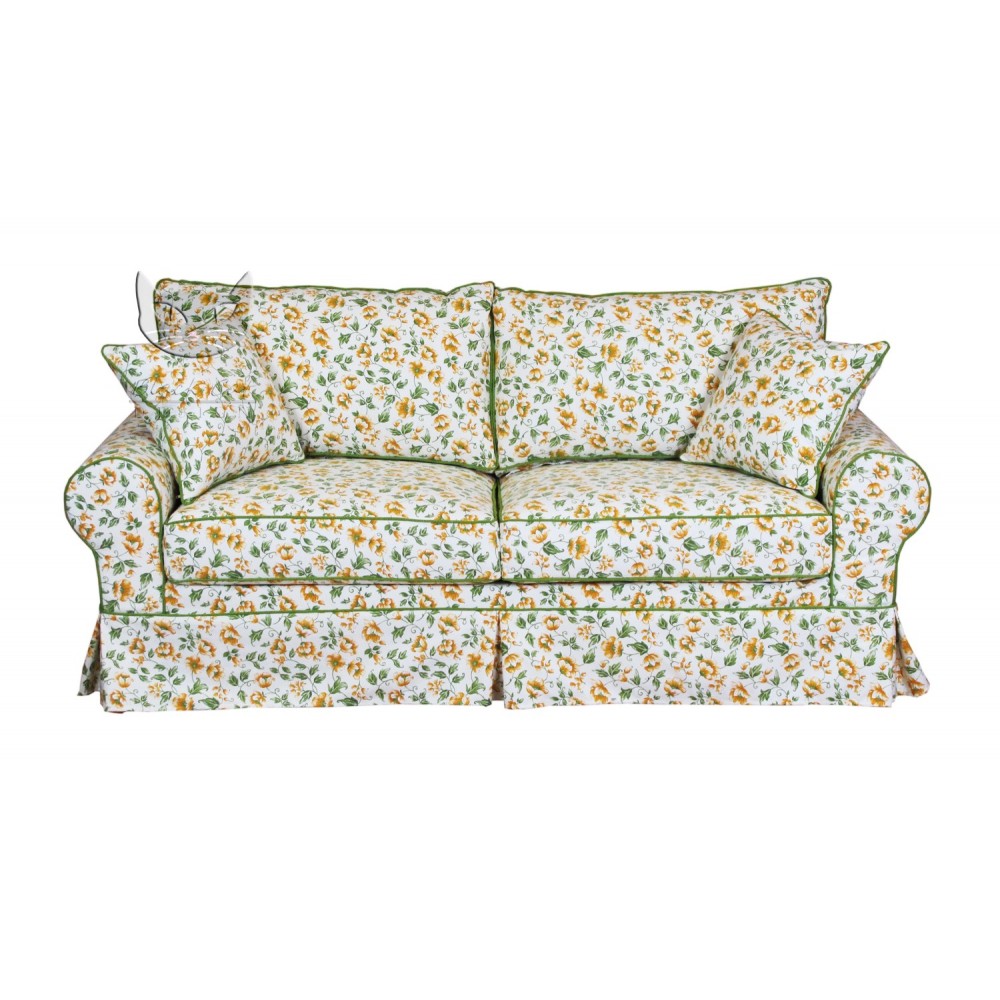 Fartuchowa sofa w kwiaty z zieloną lamówką Christine 188