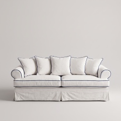 Biała lniana sofa Samantha z poduszkami i kontrastową lamówką – packshot na jasnym tle