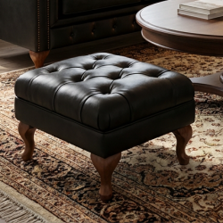 Pikowana pufa w skórze na wysokich nóżkach Sara