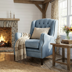 Rey pastelowo niebieski pikowany fotel do czytania